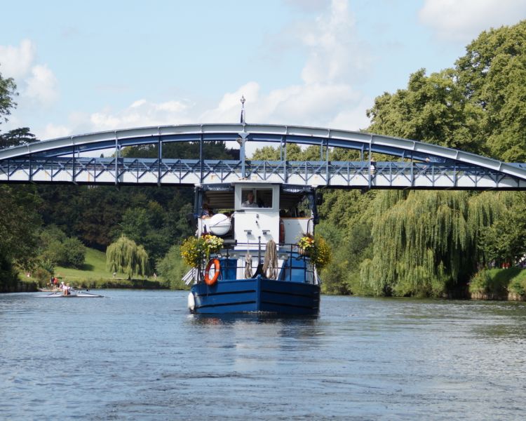 the sabrina river cruise boat sailing down the river severn on a sunny day