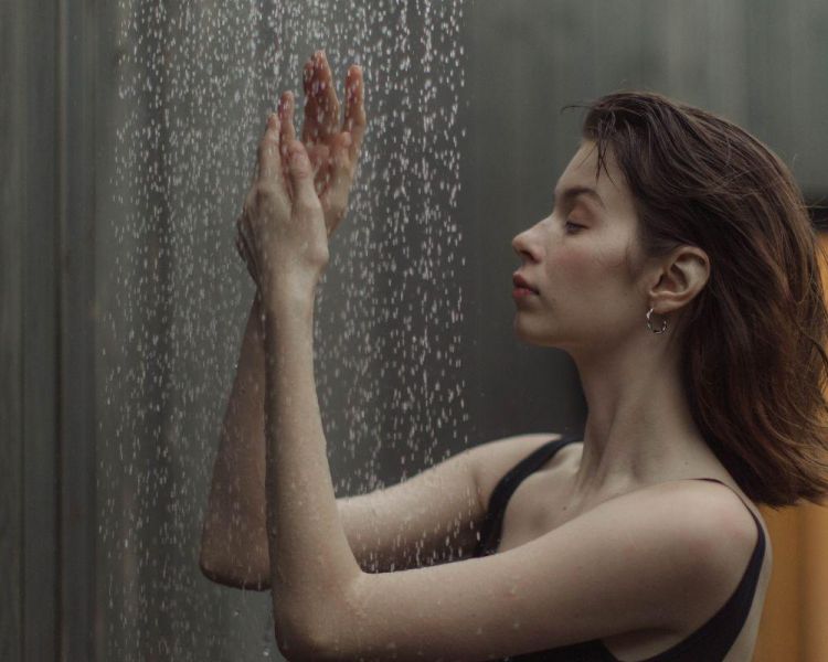 Woman Under a Spa Shower