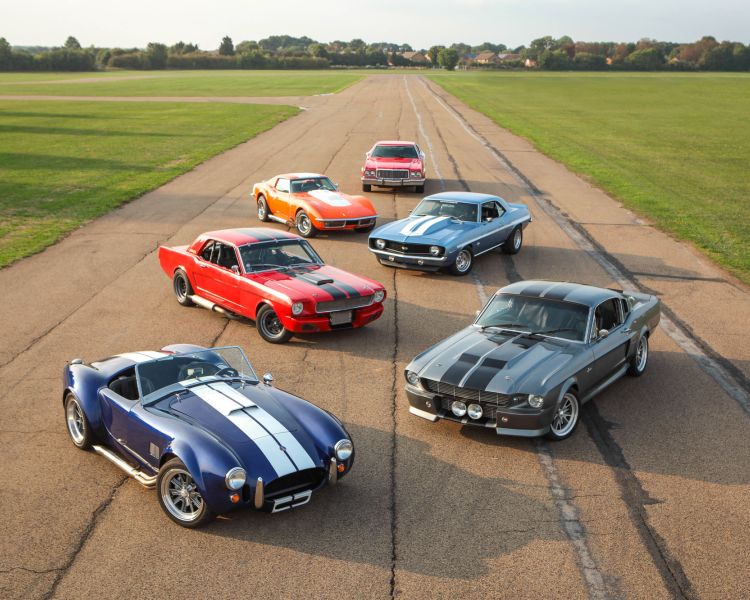 six classic cars on a race track for a supercar vs classic car driving experience
