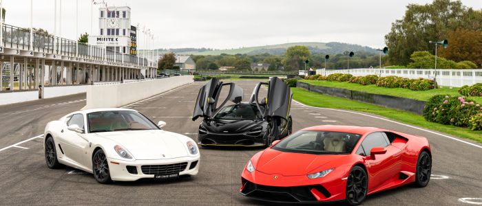 three supercars on a race track for a driving experience