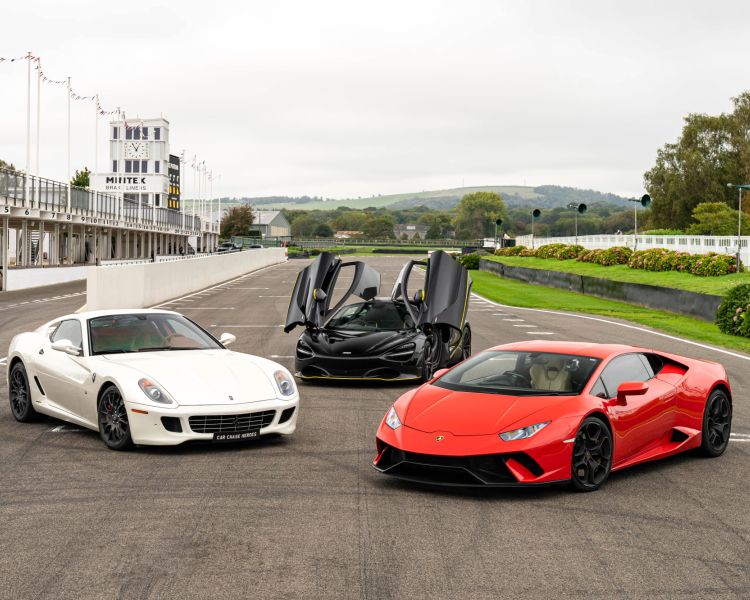 three supercars on a race track for a driving experience