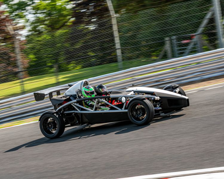 an ariel atom on a race track for a premium car driving experience