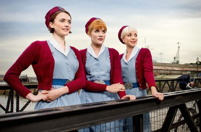 Three characters from call the midwife posing at chatham dockyard