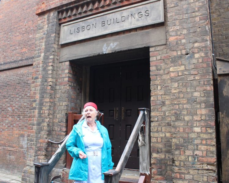 Midwife tour guide at chatham dockyard on a call the midwife locations tour