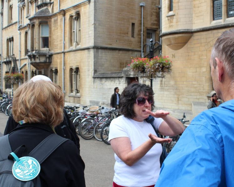 Guide talking to group on an inspector morse walking tour in oxford