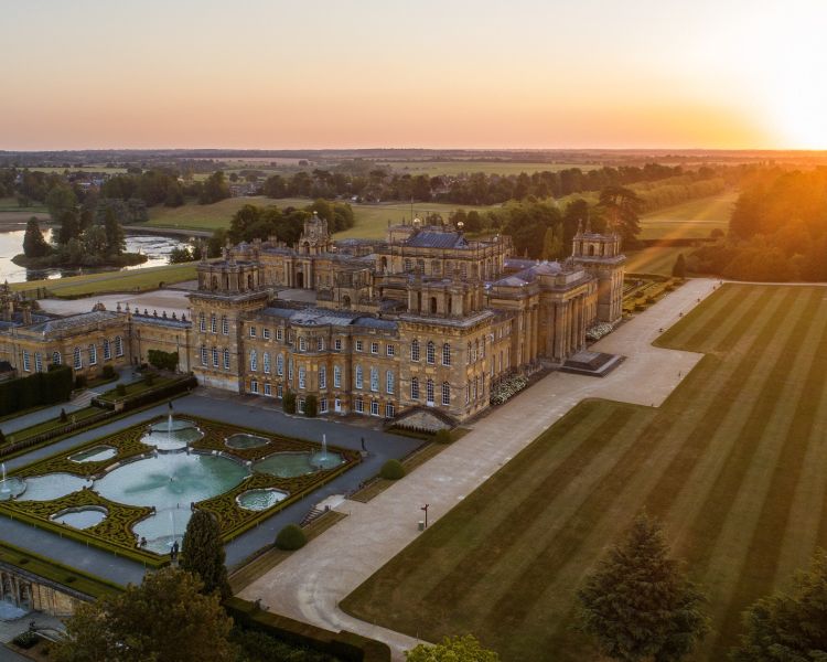 aerial shot of blenheim palace at sunset