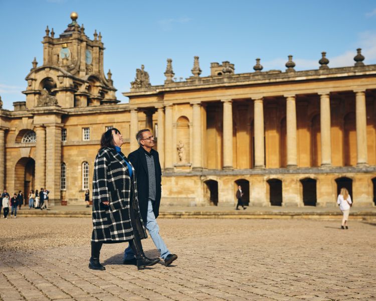 two people walking around inside blenheim palace grounds