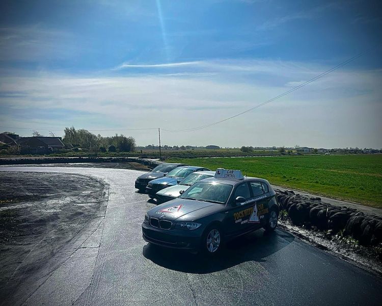 group of cars on a race track