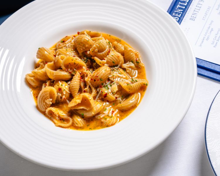 bowl of crab conchigliette for a seafood dining experience at bentley's mayfair