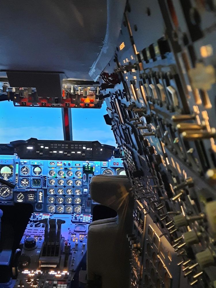 Inside of the concorde flight simulator showing the cockpit with controls 4