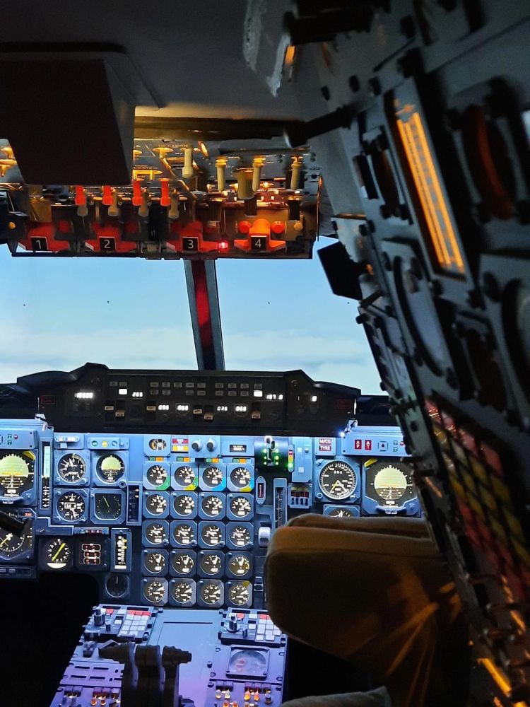 Inside of the concorde flight simulator showing the cockpit with controls 2