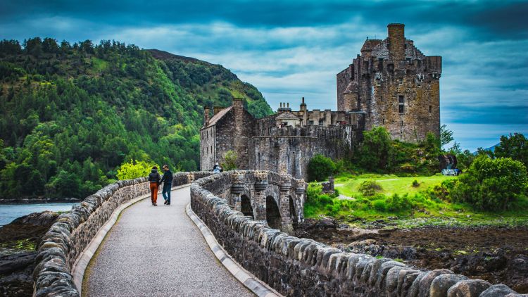 Crossing the bridge to Eilean Donan Castle which is located on Kyle Of Lochalsh which overlooks the Isle of Skye
