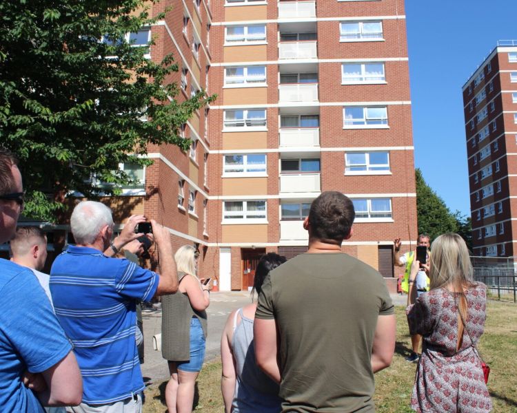 Guided tour outside mandela tower seen on the only fools and horses tour