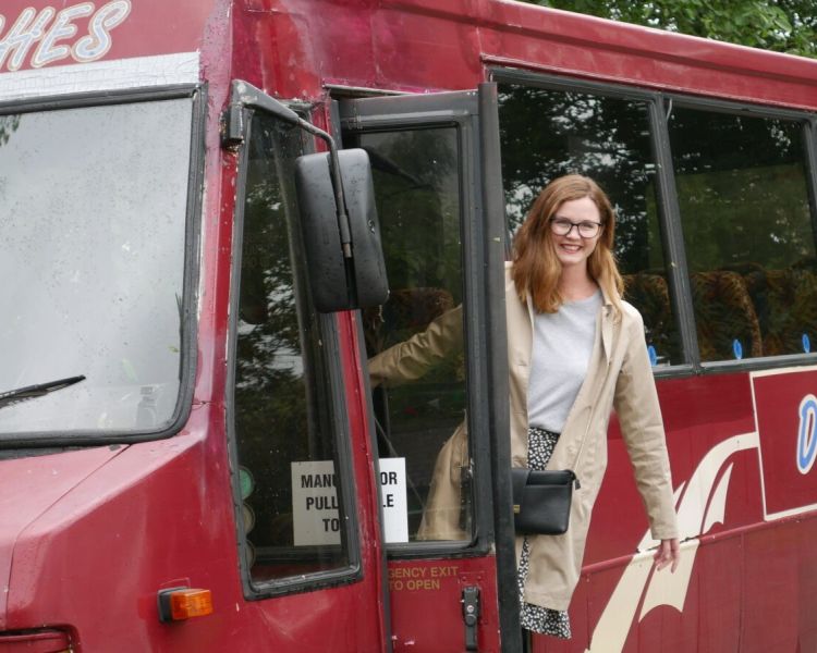 Woman on daves coach on gavin and stacey tour