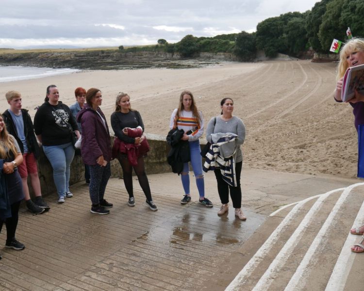 Tour group on beach on gavin and stacey tour