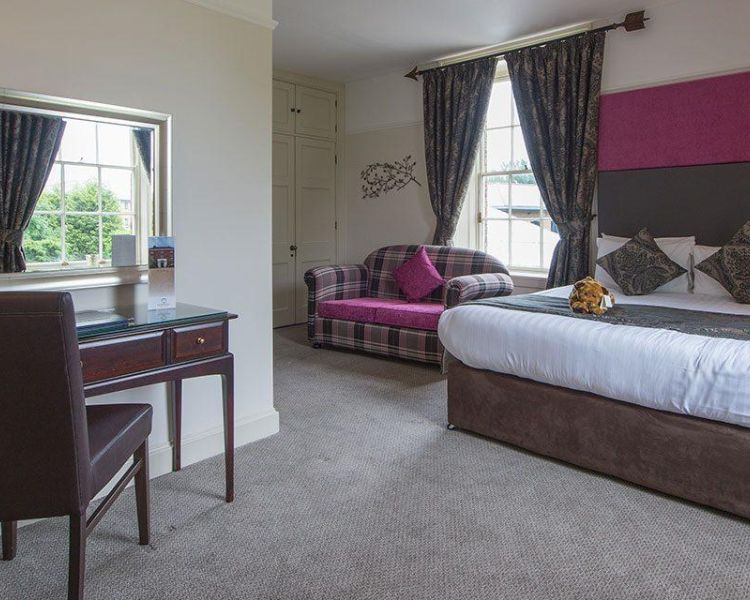 a large double bedroom at a four star shropshire hotel