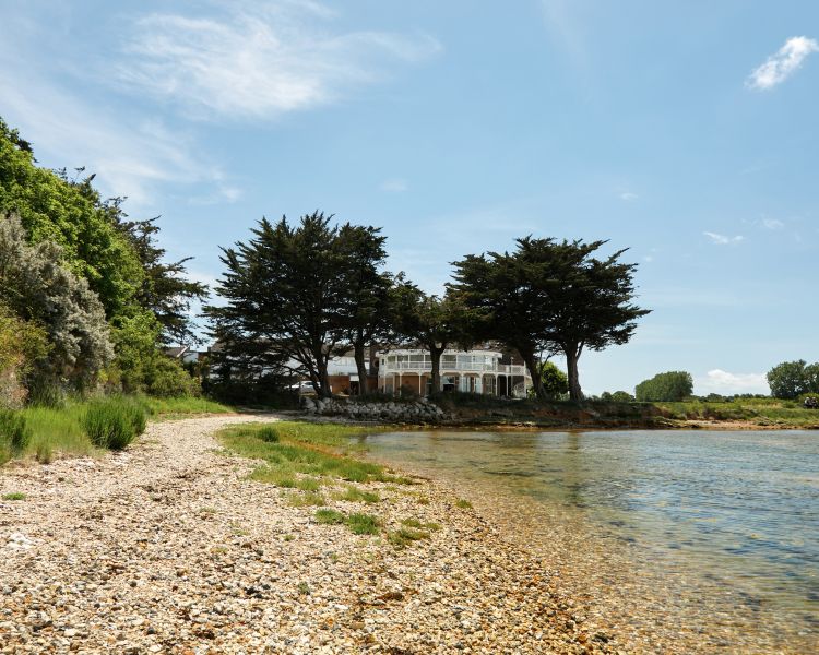 view of the waterside of a hotel in hampshire