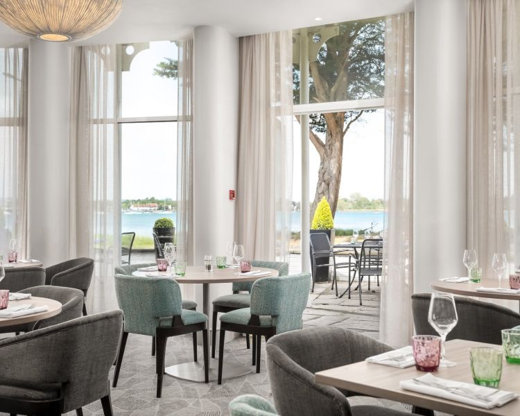 the waterside dining area of a hotel in hampshire