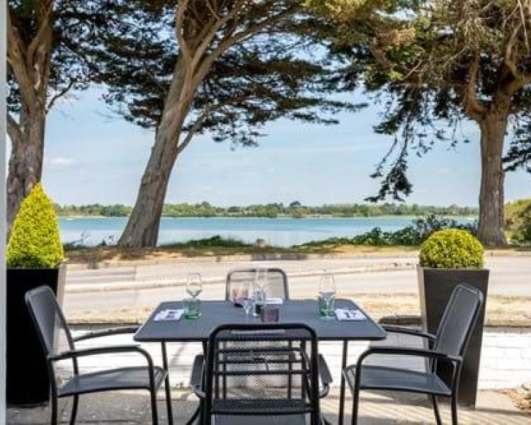 the outdoor seating area of  a hotel in hampshire