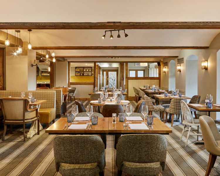 the waterside restaurant of a spa hotel resort in oswestry