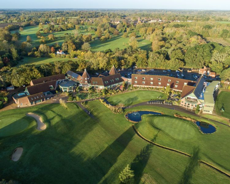 an aerial view of a hotel golf and spa resort in suffolk