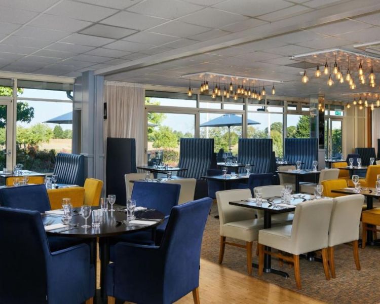 the restaurant area of a hotel golf and spa resort in suffolk