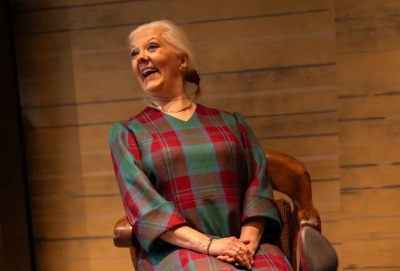 woman wearing a bespoke dress made in savile row london