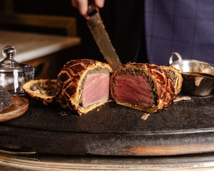 A beef wellington presented on board at corrigans mayfair