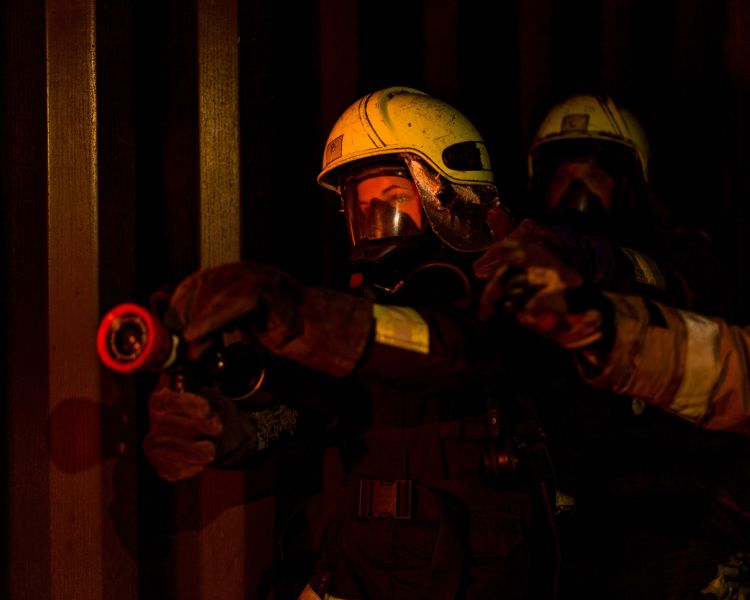 Firefighter with hose min