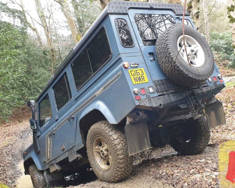 Land rover on a slope on an off road course