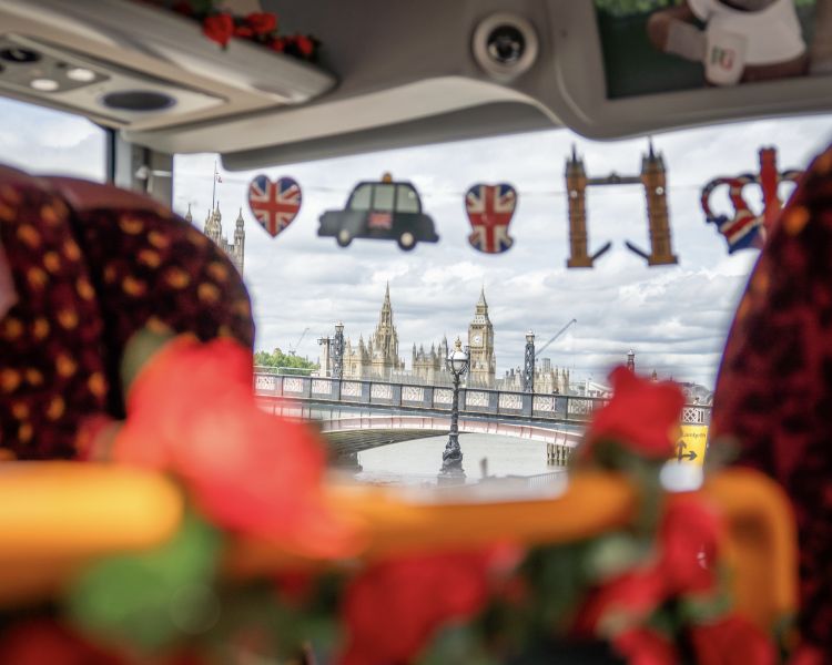 View of big ben through window of pg tips afternoon tour bus