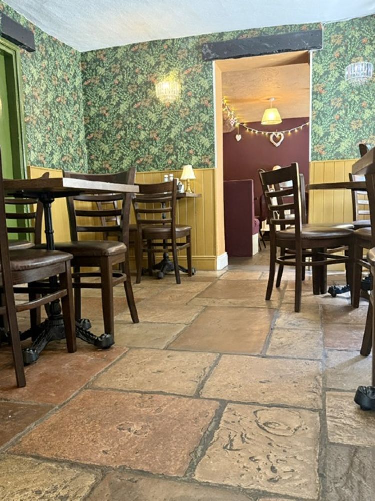 Green themed room at tea rooms in cheddar gorge