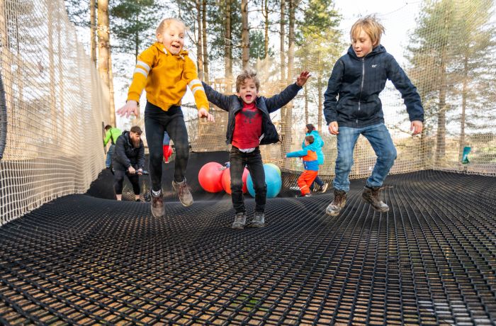 kids bouncing on nets adventure at go ape