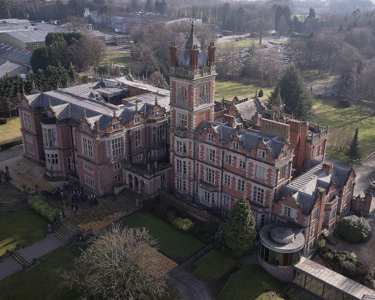 exterior shot of q hotels crewe hall hotel and grounds