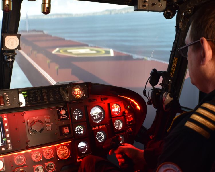 Pilot in lynx helicopter simulator