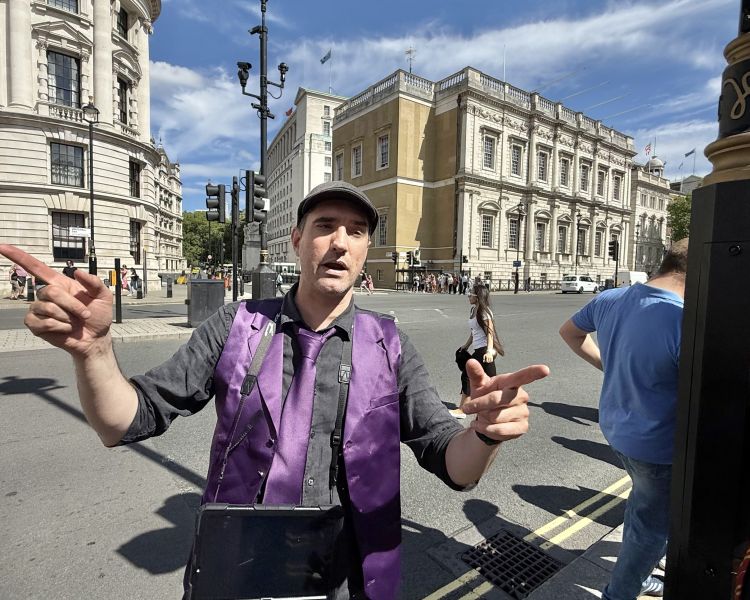 Tour guide talking on harry potter london bus tour