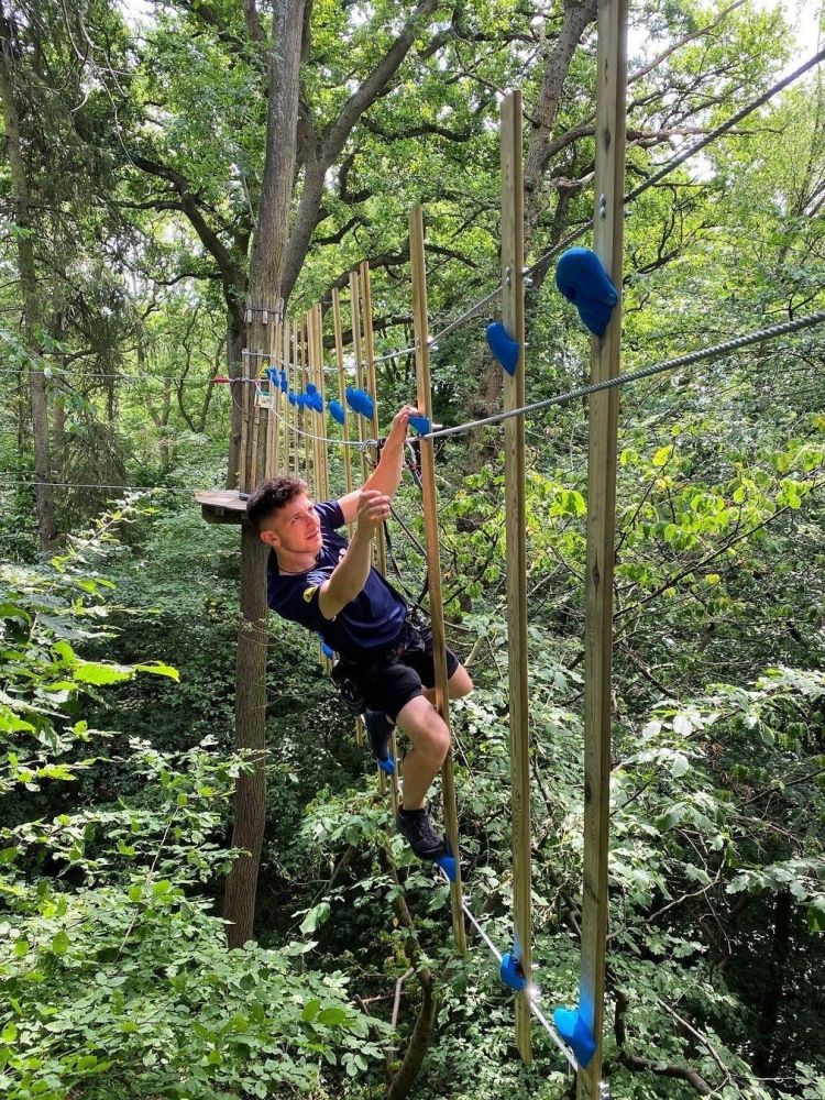 Man on the go ape challenge plus course