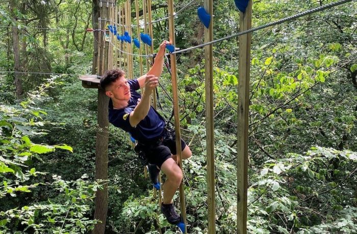 Man on the go ape challenge plus course