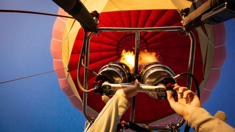 Looking up at burners on hot air balloon