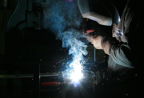 Man welding on welding experience day