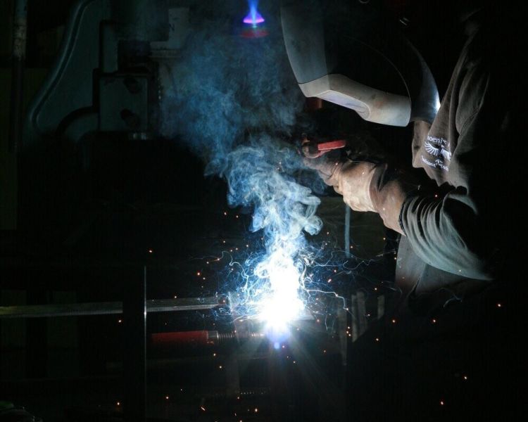 Man welding on welding experience day