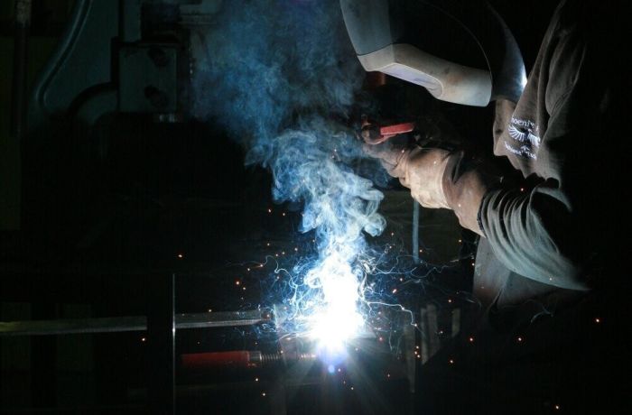 Man welding on welding experience day