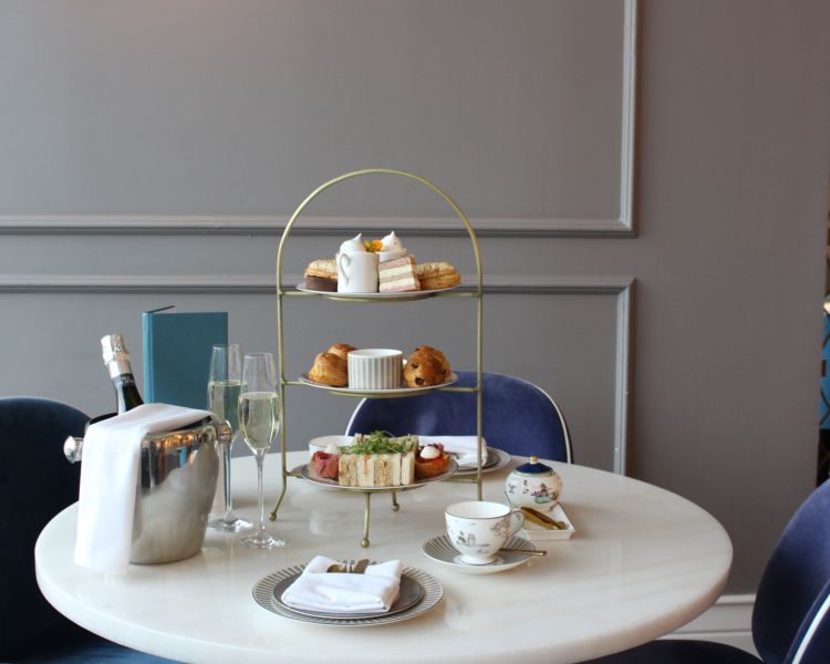 afternoon tea with prosecco set up in the wedgwood tea room