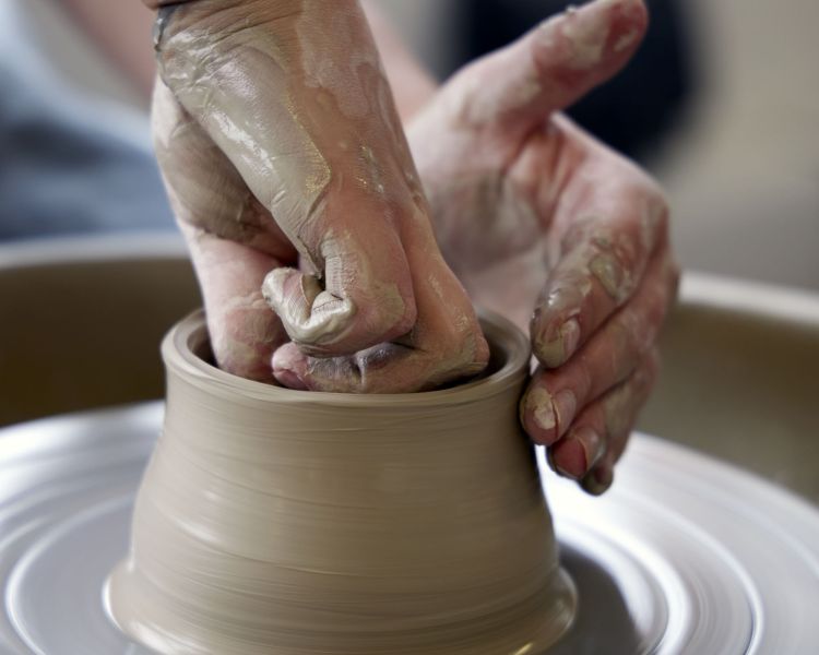close up of pot making at wedgwood pottery experience