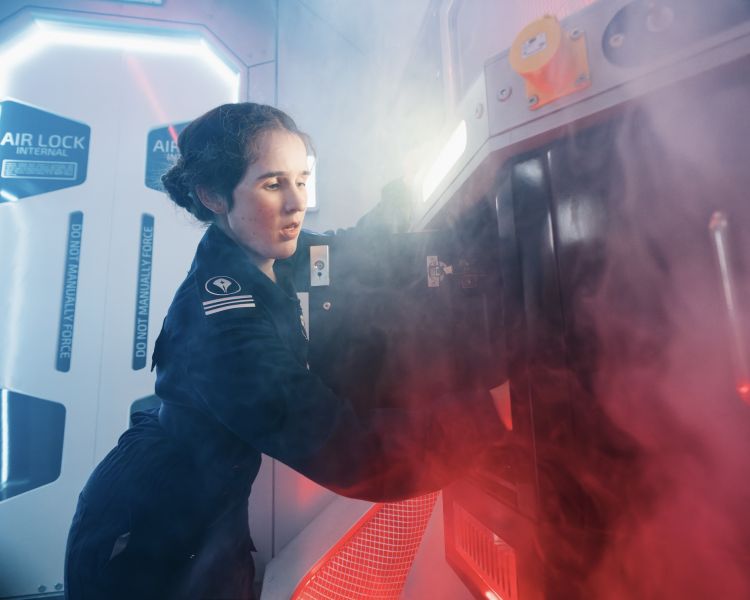 woman acting on spaceship simulator experience in london