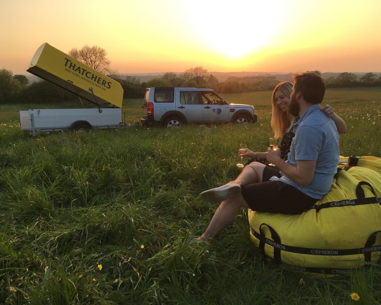 Couple drinking champagne on landing