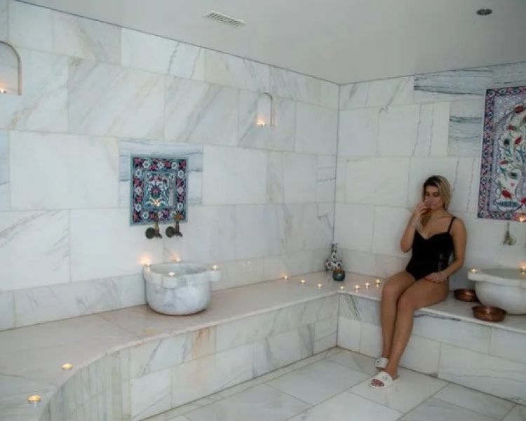 Lady in a turkish steam room