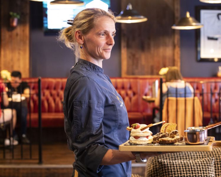 Marta welsh house server with food on welsh food tour