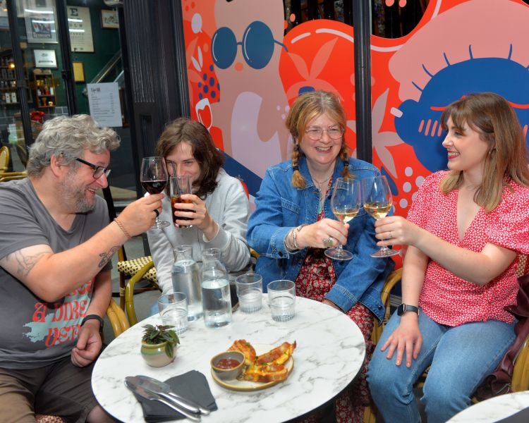 Tour group drinking wine on cardiff food tour