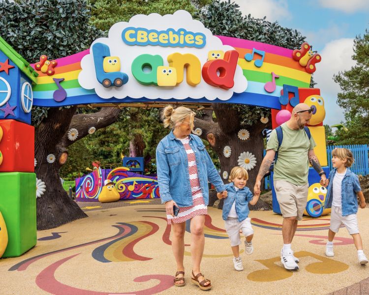 young family walking out of cbeebies land at alton towers